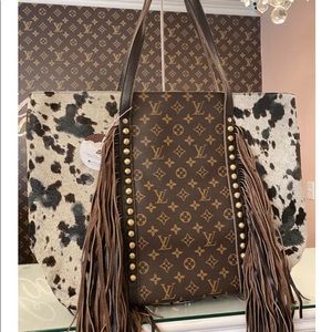 Cowhide and repurposed LV handbag